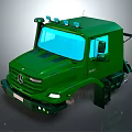 Green Mercedes Heavy Duty Truck Front View With Cab Design And Headlights