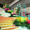 Colorful Display Cubes With Green Plants MAYA Sign And Photo Display In Exhibition