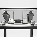 Black Glass Display Cabinet With Jewelry Items And Curved Legs