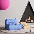 Blue Bean Bag Chair And Beige Footstool By Triangle Fireplace With Pink Sphere Decor