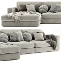 Light Gray Sofa With Multiple Patterned Pillows And Cozy Throw Blanket 3d model