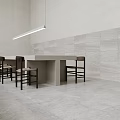 Modern Minimalist Dining and Living Room With Sofa Dining Table Hanging Lights and Concrete Walls