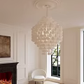Elegant White Circular Chandelier In Living Room With White Walls Fireplace Window Green Plants