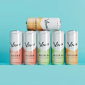 Vaygi Canned Drinks With Paloma Green Tea Mango Flavors Stacked On Light Blue Background