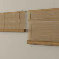Two Natural Bamboo Window Blinds Mounted On Wall With Simple Design