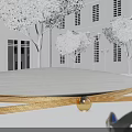 Modern Outdoor Chair With Gold Metal Frame Gray Cushion White Buildings Trees And Street Lamps