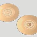 Two Golden Circular Textured Cymbals With Concentric Ring Patterns 3d model