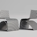 Two Modern Black And White Striped Lounge Chairs With Curved Structure And Unique Design