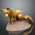 Golden Fox Sculpture Sitting On Pink Stone Base With Detailed Craftsmanship