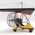 Yellow Powered Hang Glider With Black Wing Propeller Seat And Wheels