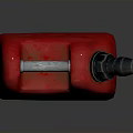 Red Plastic Jerry Can With Gray Spout And Metal Handle On Dark Surface