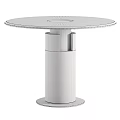 Modern Round Dining Table With Neutral Concrete Top And Brass Cylindrical Base