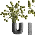 Green Spherical Flowers in U Shaped Gray Stone Vase Decorative Arrangement