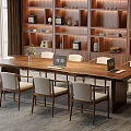 Elegant Modern Wooden Tea Table and Chairs with Light Cushions in Study Room with Bookshelves