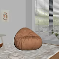 Orange Bean Bag Chair In Cozy Room Corner With Window Blinds And Wall Painting