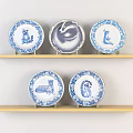 Blue And White Decorative Plates On Wooden Shelves With Animal And Abstract Patterns