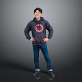 Man In Dark Hoodie With Red Circle Logo Hands On Hips Blue Jeans Gray Background