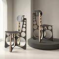 Pair Of Modern Accent Chairs With Geometric Cutouts And Black Wood Frame In Bright Room