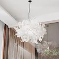 Elegant Modern White Petal Shaped Chandelier In Interior Space With Wooden Accents And Natural Light