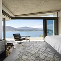 Modern Hotel Room With Lake And Mountain View Fireplace Armchair And Area Rug