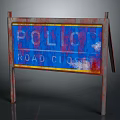 Rusty Road Sign Displaying Polio Road Close Text With Worn Out Edges