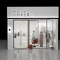 Stylish Fashion Clothing Store With Glass Window Display Featuring Mannequins And Apparel