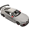 White BMW F201M Race Car With Large Rear Wing And Sporty Exterior Design