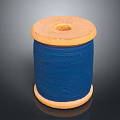 Wooden Spool Of Blue Thread For Daily Sewing And Craft Use