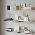 Modern Floating Shelves with Stacked Books Magazines Vase Twigs Framed Art and Record Player