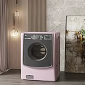 Modern Pink Washing Machine Interior With Stylish Wall Art And Green Plant