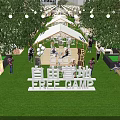 Vibrant Commercial Street with Tents String Lights and Green Grass at Free Camp