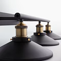 Modern Black Wall Sconce Featuring Three Gold Accent Lamps for Home Decor