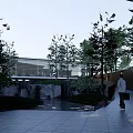 Modern Sales Office Building With Waterfall Pond Green Lawn and Lush Greenery