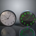 Two Analog Clocks With White And Glowing Green Dials Metal Frames On Gray Background