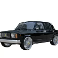 Black Classic Four Door Sedan With Silver Spoke Wheels And Vintage Design