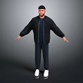 Man in Black Jacket Dark Pants White Shoes with Arms Outstretched on Gray Background