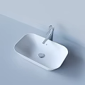 White Square Washbasin with Silver Faucet on Light Colored Wall and Countertop