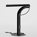 Modern Black Table Lamp With Curved Stand Round Base And Sleek Design