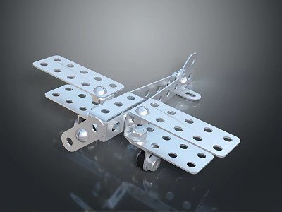 Metallic Toy Airplane Model With Holes And Assembled Metal Pieces On Dark Background 3d model