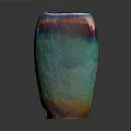 Colorful Ceramic Vase With Blue Green Red Orange Gradient And Glossy Finish On Dark Background