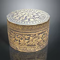 Decorative Showcase Shelf Displaying Golden Carved Box With Intricate Floral Patterns