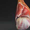 Suspended Cured Ham Leg With Marbled Meat And Fat On Dark Background