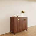 Walnut Decorative Cabinet With Golden Round Knobs And Books On Top Near Light Wall 3d model