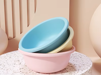 Colorful Plastic Vegetable Washing Basins Stacked on Speckled Round Table 3d model