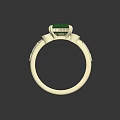 Gold ring adorned with square green gemstone and small white green surrounding decorative stones carved details