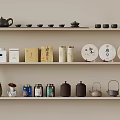 Elegant Tea Sets Decorative Items and Tea Cakes Display on Shelves 3d model
