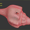 Pinkish Speckled Stone Conch Shell Sculpture With Textured Surface Carved Details And Central Hole