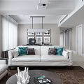Modern Living Dining Room Interior With White Sofa Coffee Table And Decorative Paintings