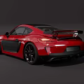 Red Two Door Sports Car With Black Side Panels And Yellow Rims