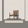 Brown Leather Leisure Chair With Wooden Frame On White Platform And Gray Throw Blanket